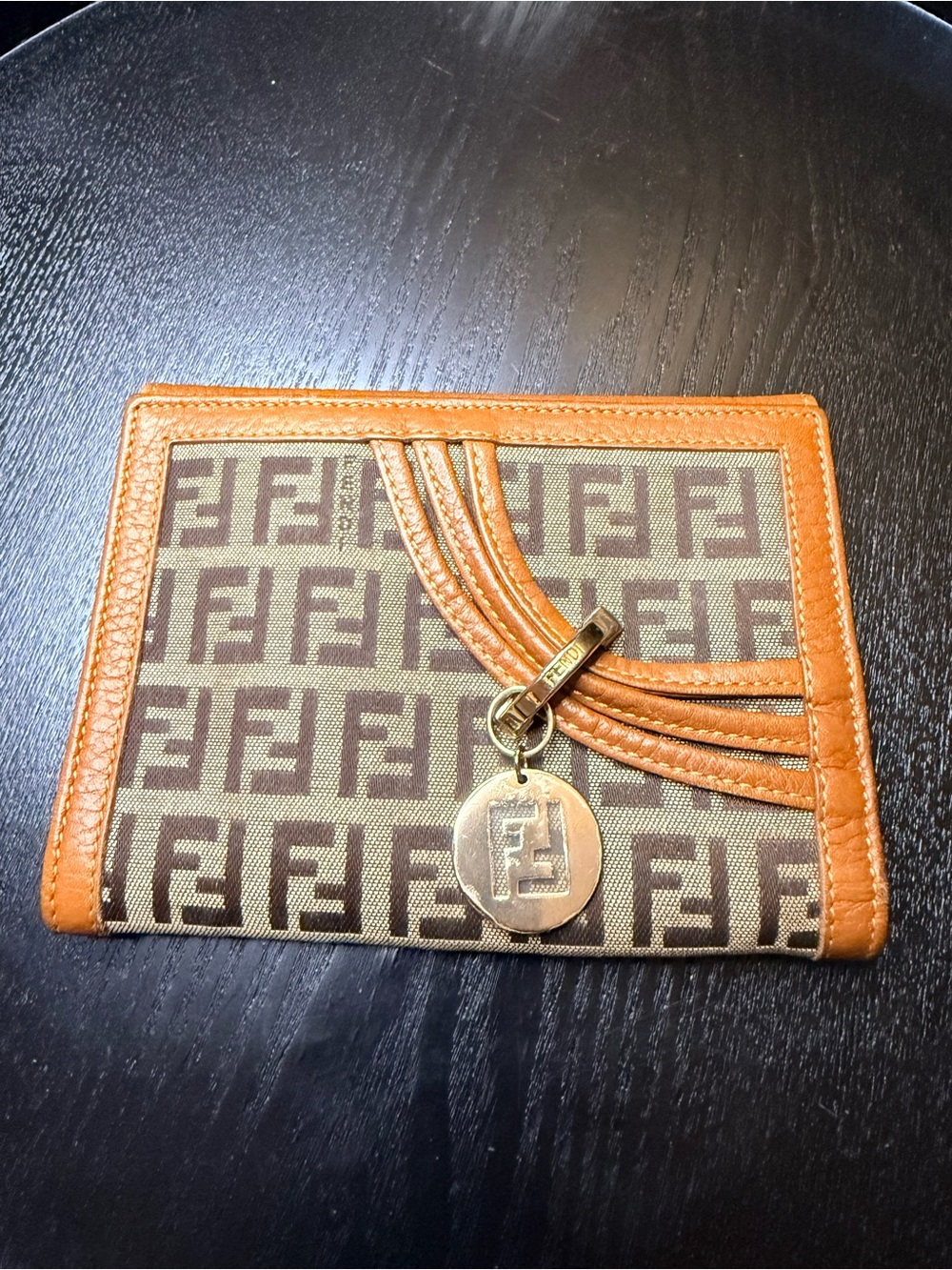 Fendi Brown Zucca Canvas Trifold
Wallet with Charm